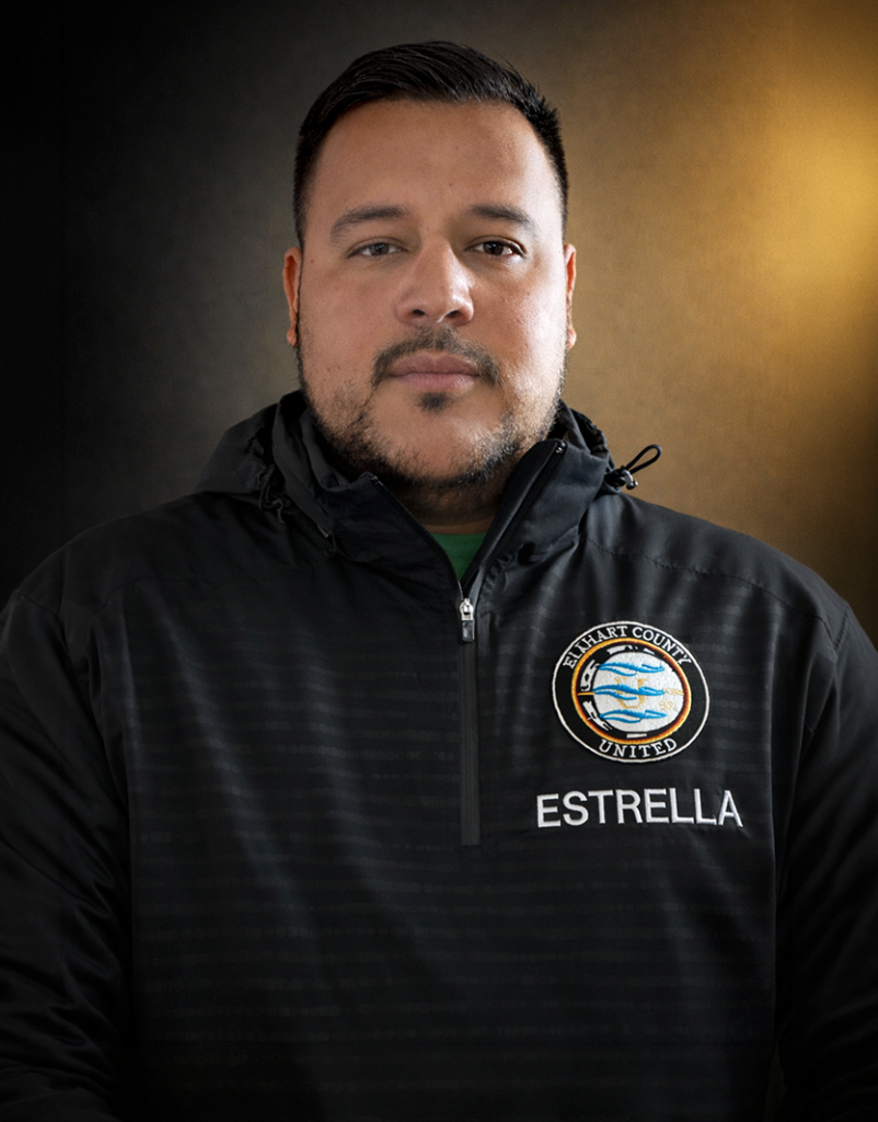 Headshot of Director of Coaching Briant Estrella